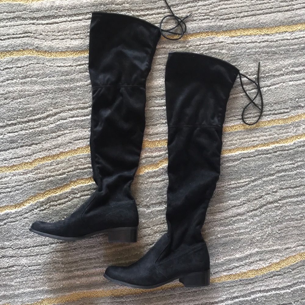 Black over the knee boots.